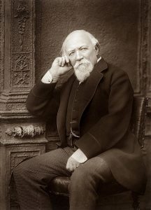 A black and white photograph of the Victorian poet Robert Browning