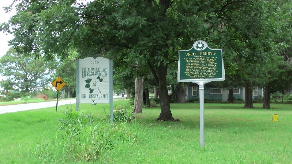 The original sign designating Uncle Henry's, aka Moon Lake Casino. Next to it is a state historical marker, describing Uncle Henry's and its place in local history.